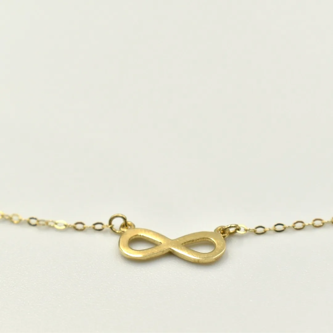χρυσό κολιέ Κ9 άπειρο κωδ. NECK9019 close-up σχέδιο